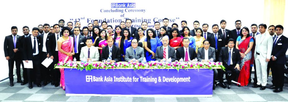 A Rouf Chowdhury, Chairman of Bank Asia poses with participants of 42nd Foundation Training Course at its training institute in the city on Tuesday. DMD Mian Quamrul Hasan Chowdhury, Head of ICCD Md Sazzad Hossain, Head of HRD KS Nazmul Hasan and Head of