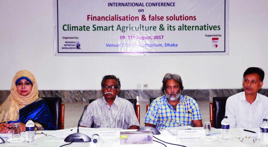 Prof Anu Mohammad, among others, at an international conference on 'Finacialization & False Solutions: Climate Smart Agriculture & Its Alternatives' organised by Research Initiatives Bangladesh in CIRDAP Auditorium in the city on Thursday.