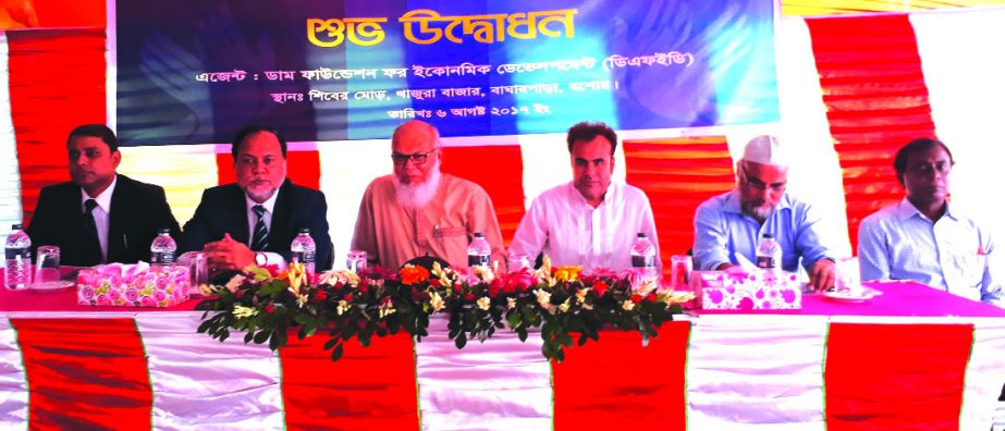 Dr. M Ehsanur Rahman, Executive Director of Dhaka Ahsania Mission and Secretary General of DAM Foundation for Economic Development, presiding over the inaugural ceremony of the two agent outlets of Bank Asia at Khajura Bazar in Jessore recently. Deputy Ma