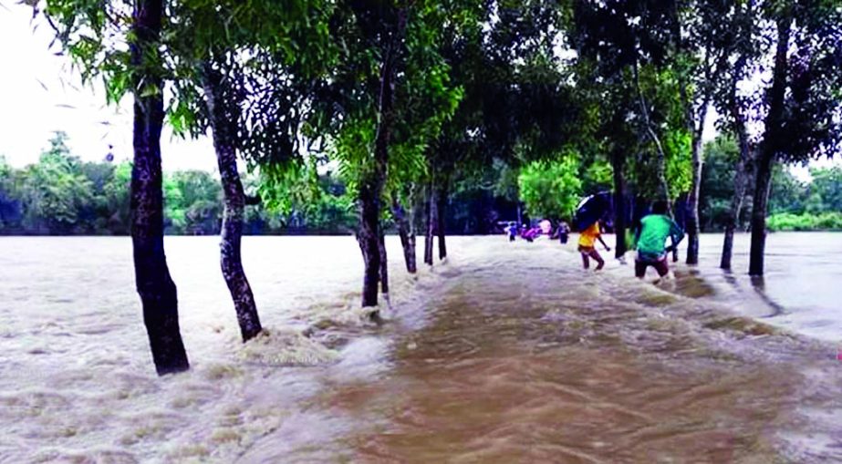 Northeastern districts being inundated with fresh flood due to incessant rains and onrush of hilly waters. This photo was taken from Habiganj on Saturday.