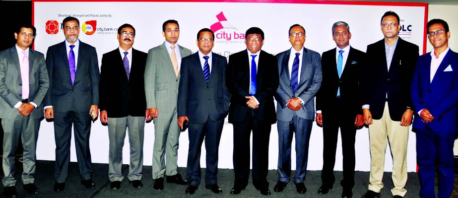Sohail RK Hussain, Managing Director of City Bank Ltd, poses with the participants of the process of issuing Coupon Bearing Subordinated Bonds worth Tk 500 crore at the bank's head office in the city recently. Top executives from participating banks and