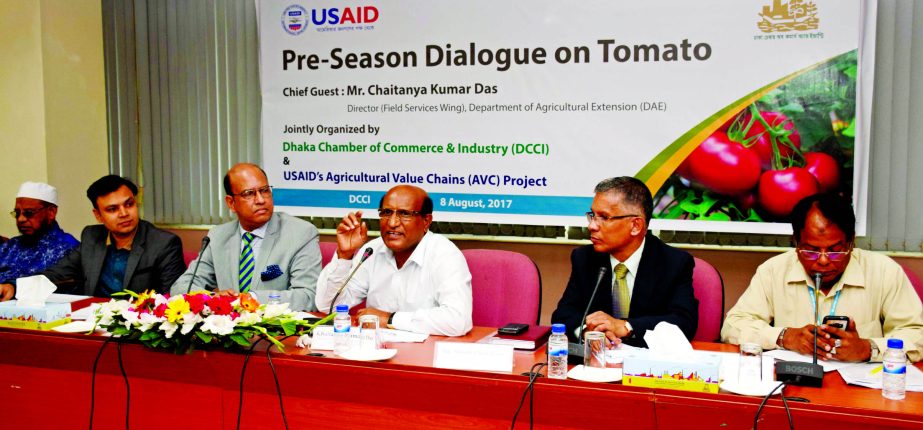 Chaitanya Kumar Das, Director of Department of Agricultural Extension of Agriculture Ministry, addressing at a 'pre-season dialogue on Tomato' jointly organized by Dhaka Chamber of Commerce and Industry and USAID's Agricultural Value Chains Project (AV