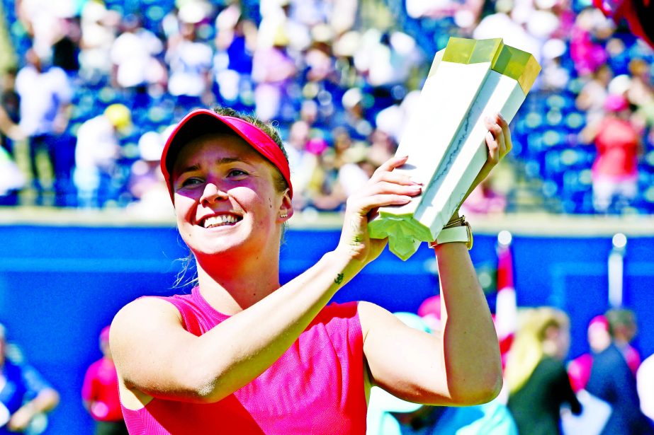 Ukraine's Elina Svitolina holds the winner's trophy after defeating Caroline Wozniacki of Denmark in the final of the Rogers Cup women's tennis tournament in Toronto on Sunday.