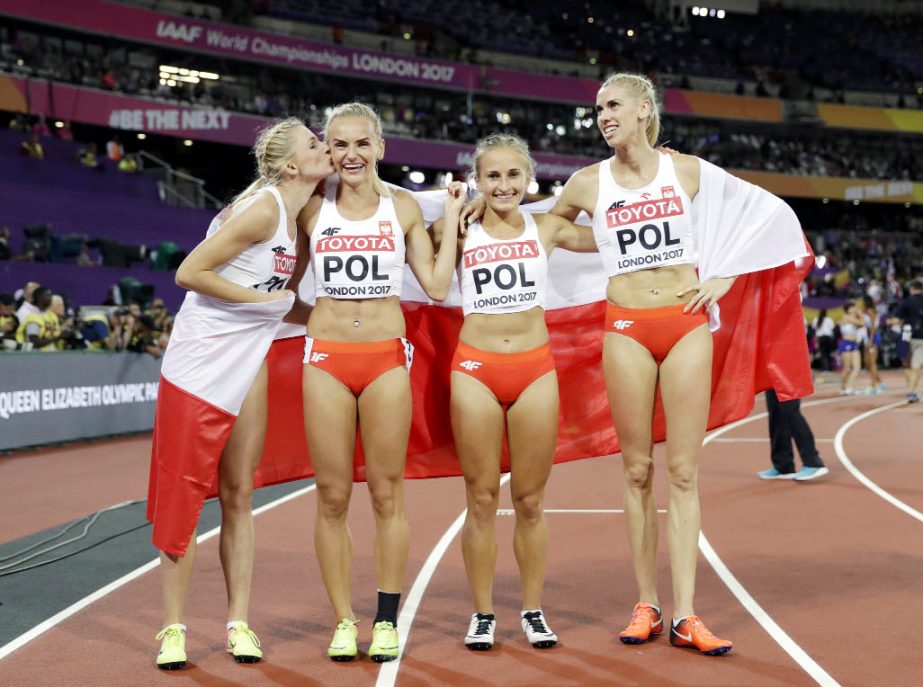The bronze medal winning Polish women's 4x400-meter relay team celebrate during the World Athletics Championships in London on Sunday.