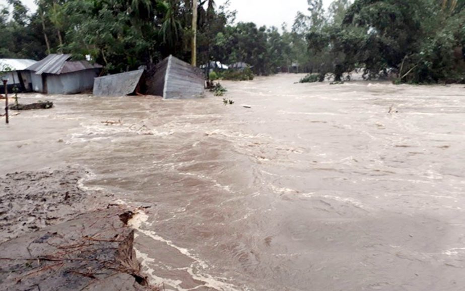 Purba Barua village of Lalmanirhat Sadar Upazila was inundated by the tidal water as the dam of the upazila was broken. Due to this one was missing and body of two were recovered. The snap was taken on Monday