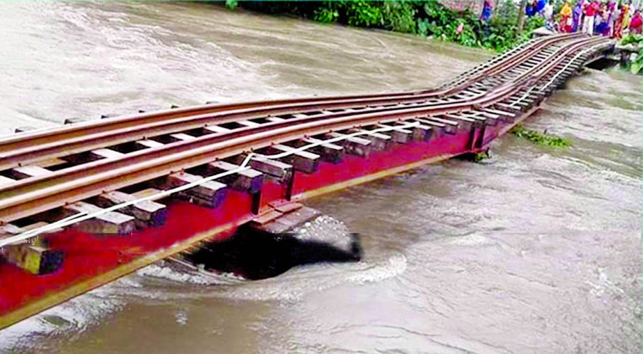 Railway line broke down as six embankments collapsed following strong current of the hilly waters in Teesta and Dharla rivers in Kurigram. This photo was taken on Monday.