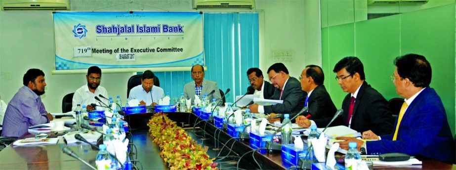 Akkas Uddin Mollah, Director of Shahjalal Islami Bank Limited, presiding over its 719th EC meeting at the bank head office in the city recently. Farman R Chowdhury, Managing Director, Engineer Md. Towhidur Rahman, Mohammed Younus, Khandaker Sakib Ahmed, D