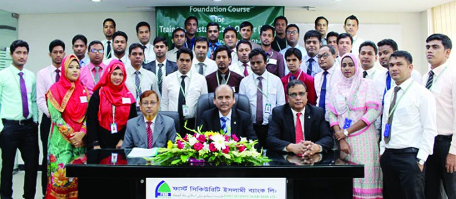 Quazi Osman Ali, Additional Managing Director of First Security Islami Bank Ltd. poses with the participants of its 25th Foundation Course of Trainee Assistant Cash Officers at its training institute in the city on Thursday. Md. Ataur Rahman, Principal an