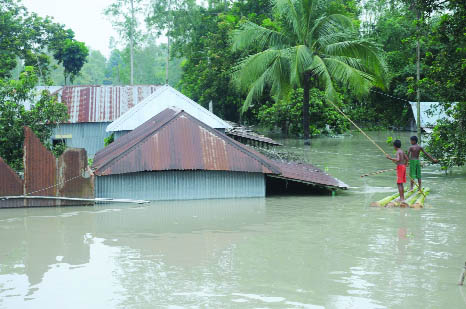 BOGRA: Chandonbaish Village in Sariakandi Upazila has been flooded . This snap was taken yesterday.