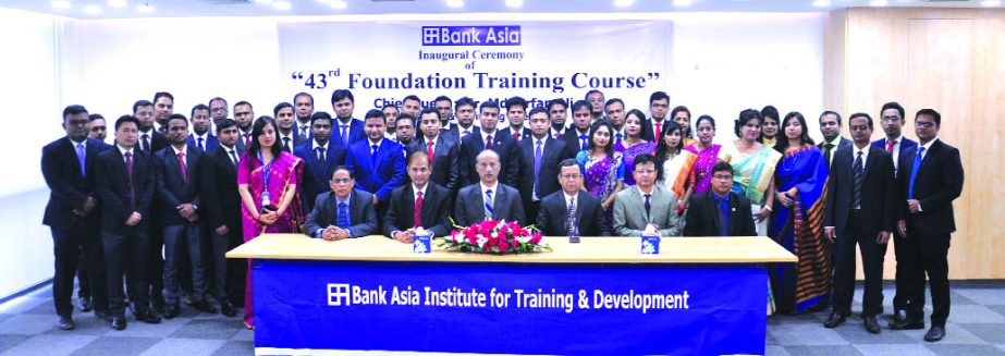 Mian Quamrul Hasan Chowdhury, DMD of Bank Asia Limited, poses with the participants of 43rd Foundation Training Course at the bank's Institute for Training and Development in the city on Sunday. Md. Sazzad Hossain, Head of ICCD and KS Nazmul Hasan, Head