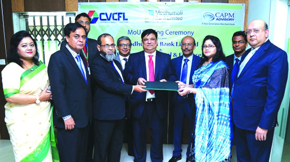 Md. Shafiul Azam, Managing Director of Modhumoti Bank Limited, Md. Moktadir Hossain, Managing Director (CC) of CAPM Venture Capital and Finance Limited and Tania Sharmin, Managing Director of CAPM Advisory Limited, exchanging a tripartite agreement signin