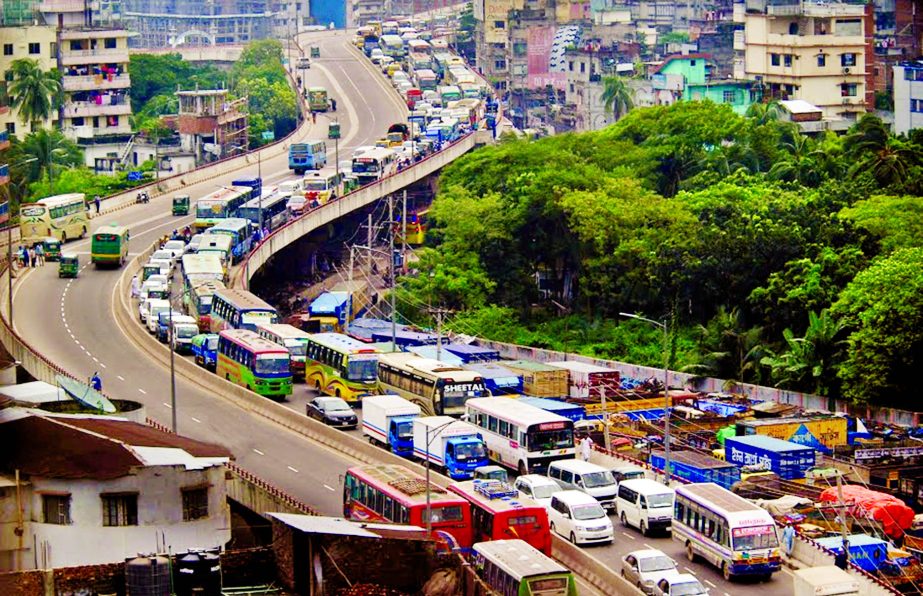 Apart from city thoroughfares, traffic congestion on city flyovers has also turned acute nowadays, causing immense sufferings to commuters everyday. This photo was taken from Mayor Hanif Flyover in Tikatuli area on Sunday.