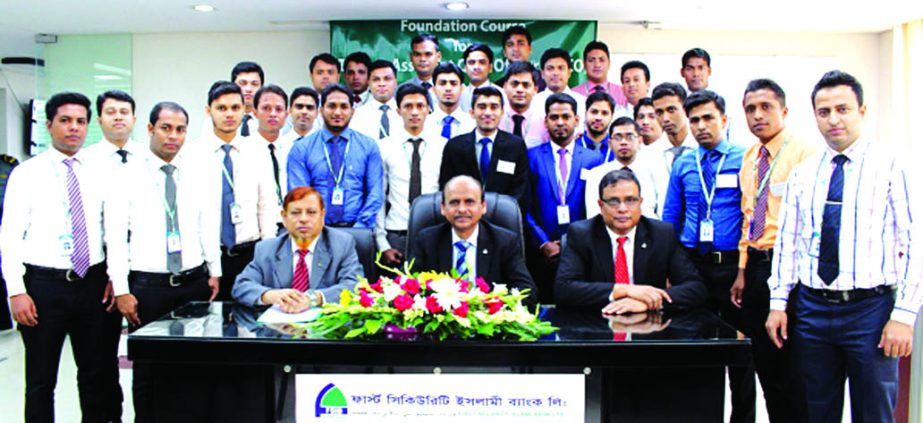 Quazi Osman Ali, Additional Managing Director of First Security Islami Bank Limited, poses with the participants of its 26th Foundation Course of Trainee Assistant Cash Officers at the bank's Training Institute in the city on Thursday. Md. Ataur Rahman,