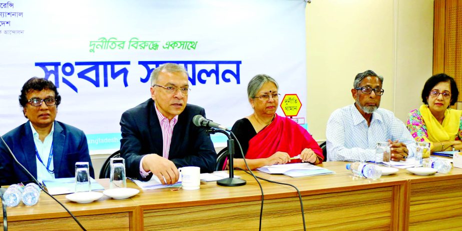 TIB Executive Director Dr Iftekharuzzaman speaking at a Press Conference at MIDAS Cadre in the city on Monday, marking the release of a survey report on 'Good Governance in Passport Services: Challenges and Doings.