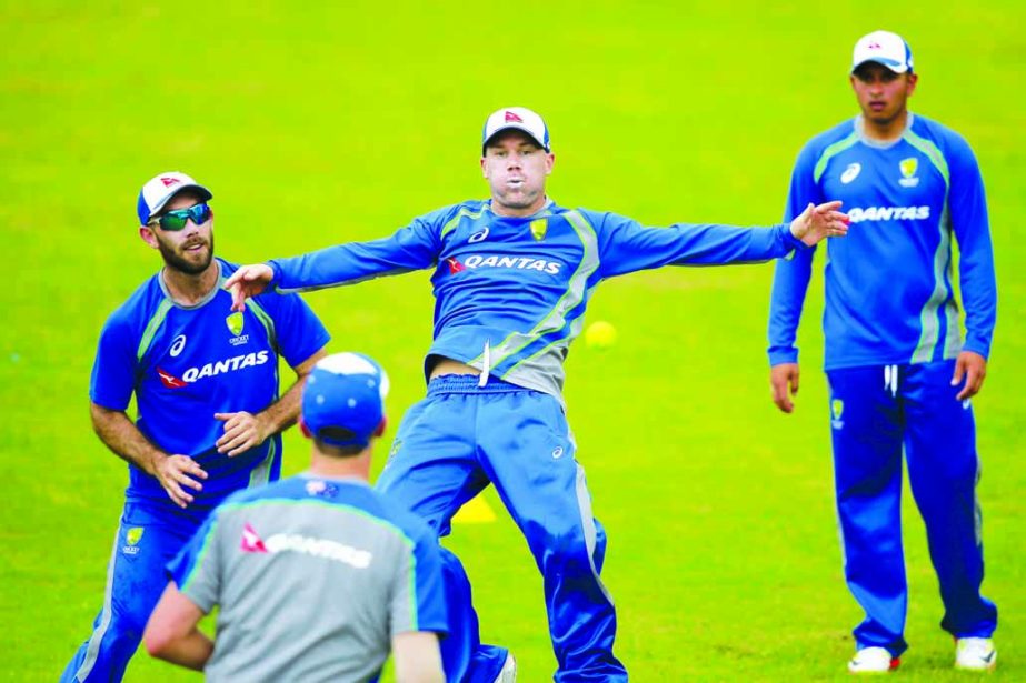 Australia's cricket players (from left) Glenn Maxwell, David Warner and Usman Khawaja playing with a ball during a practice session in Dhaka on Monday. Australia is scheduled to play two Test matches against Bangladesh beginning August 27 in Dhaka.