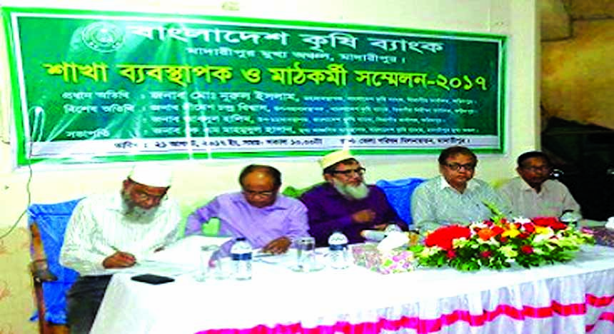 Md. Nurul Islam, General Manager of Faridpur Division of Bangladesh Krishi Bank, addressing at its Branch Managers, Field Staff Conference of Madaripur Chief Region at a local auditorium on Monday. KM Mahmudul Hasan, CRM of Madaripur Chief Region and Din