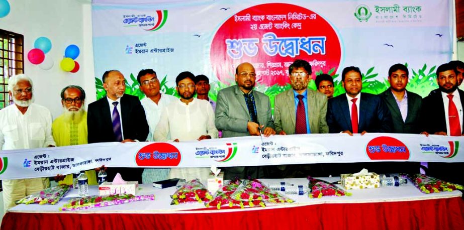 Abu Reza Md Yeahia, DMD of Islami Bank Bangladesh Limited, inaugurating its second Agent Banking Outlet in Berirhat Bazar, Alfadanga Upazila in Faridpur on Thursday. Md. Taher Ahmed Chowdhury, DMD, Md. Mahboob Alam, Head of Agent Banking Division and Md.