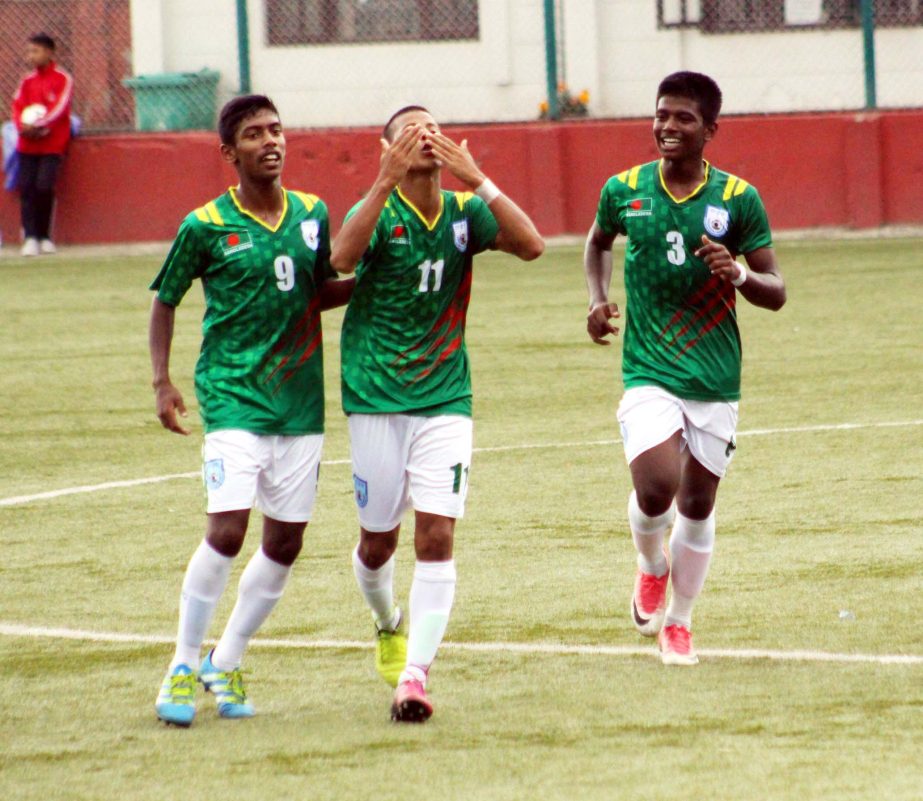 Players of Bangladesh Under-15 Football team celebrating after scoring a goal against their counterpart Bhutan Under-15 Football team in their SAFF Under-15 Championship at Kathmandu, the capital city of Nepal on Tuesday.