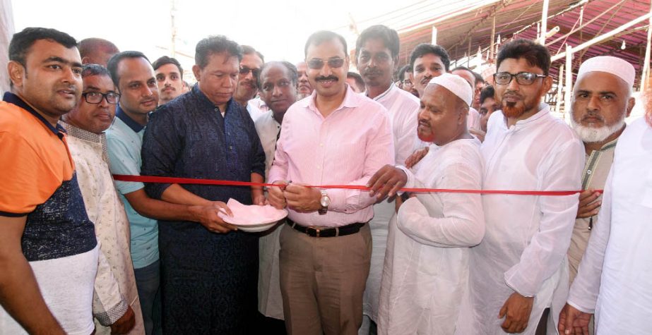 CCC Mayor A J M Nasir Uddin inaugurating Karnophuli Cattle market organised by CCC on Wednesday.