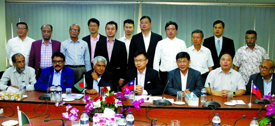 Md. Jashim Uddin, President of Bangladesh Plastic Goods Manufacturers & Exporters Association, presiding over a meeting with a visiting Taiwanese delegation at its office in the city on Wednesday. James CF Huang, Chairman of Taiwan External Trade Developm