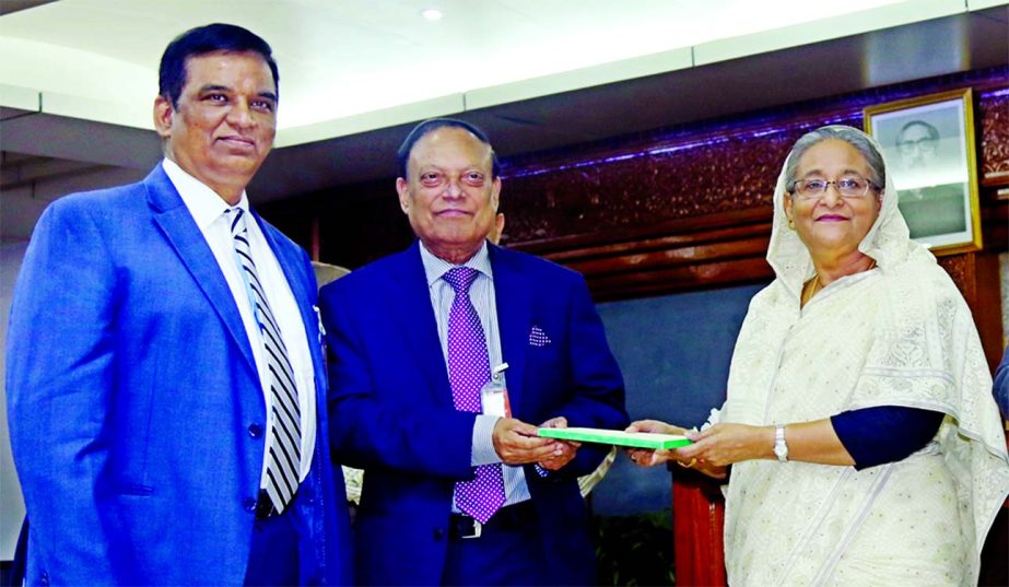 Habibur Rahman, Chairman, Board of Directors of Pubali Bank Limited, handing over a donation cheque of Tk 3 cr to Prime Minister Sheikh Hasina at Ganabhaban on Thursday as a donation to the Prime Minister's Relief Fund for the rehabilitation of flood vic