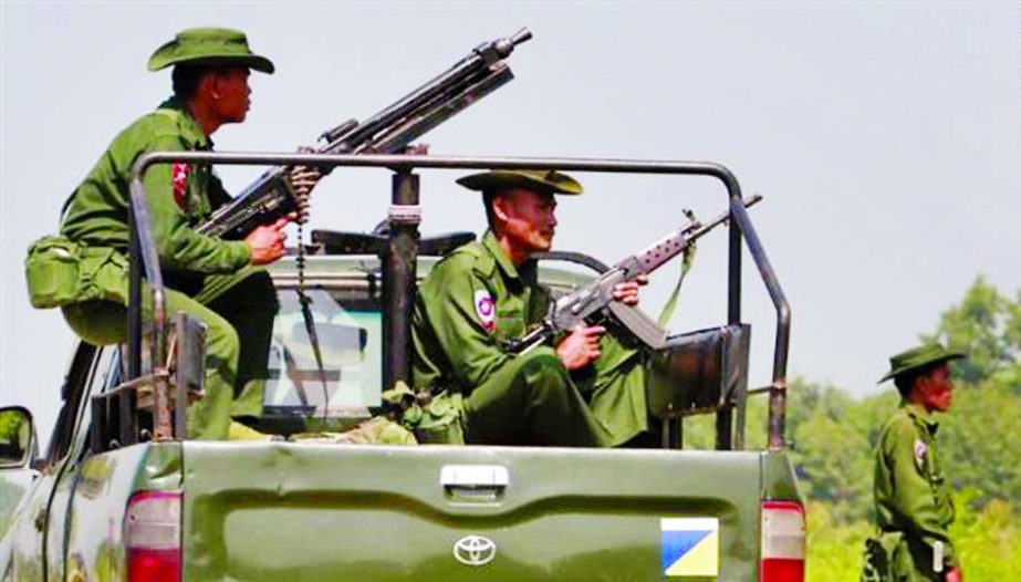 Heavily armed Myanmar troops patrol in Rakhine State.