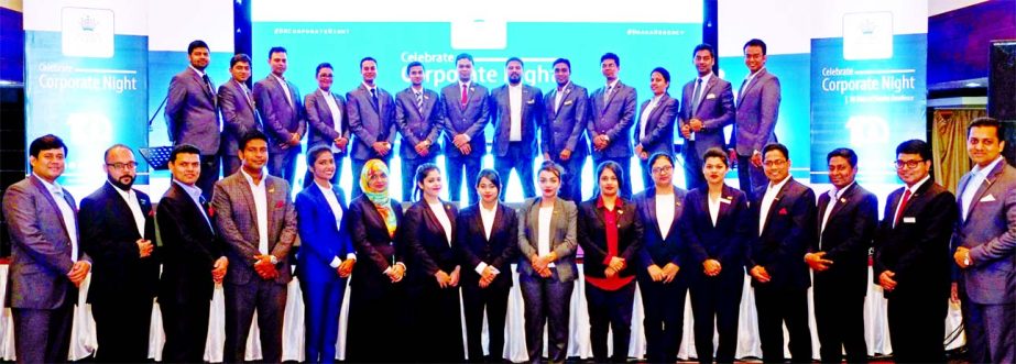 Musleh Ahmed, Chairman of Dhaka Regency Hotel, poses with the participants of the Corporate Night Programme at its Celebration Hall on Thursday. Shahid Hamid, Executive Director of the hotel, country's renowned business companies, representatives from ai