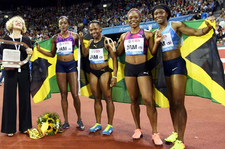 Mayor of the city of Zurich Corinne Mauch, left, congratulated the winning Jamaican team from left, Elaine Thompson, Jura Levy, Christania Williams and Simone Facey, after the Women's 4x100m Relay during the Weltklasse IAAF Diamond League international a