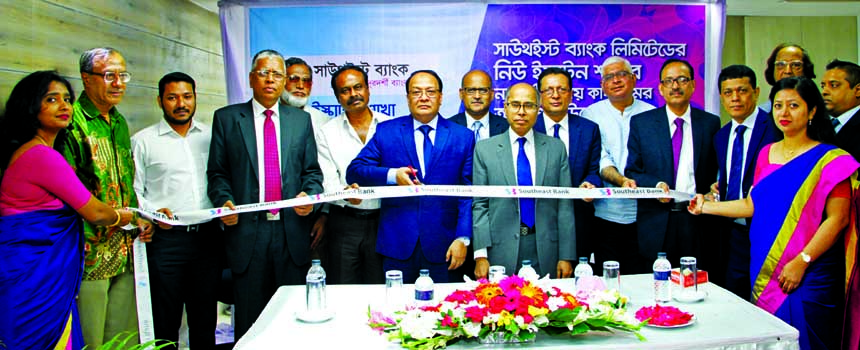 M Kamal Hossain, Managing Director of Southeast Bank Limited, inaugurating its shifted branch at New Eskaton Road in the city on Sunday. High officials of the bank were also present.