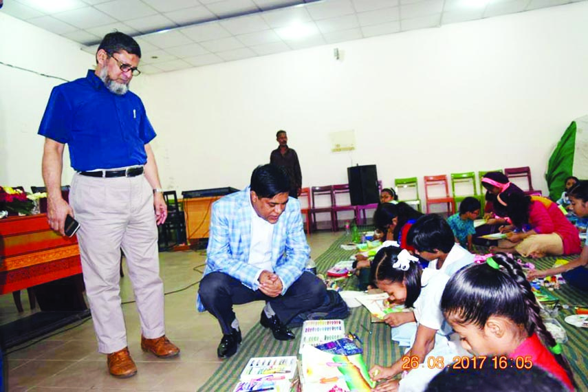 Children engrossed in painting at a drawing competition organised on the occasion of World Ozone Day by Environment Directorate at Bangladesh Shishu Academy in the city on Saturday.