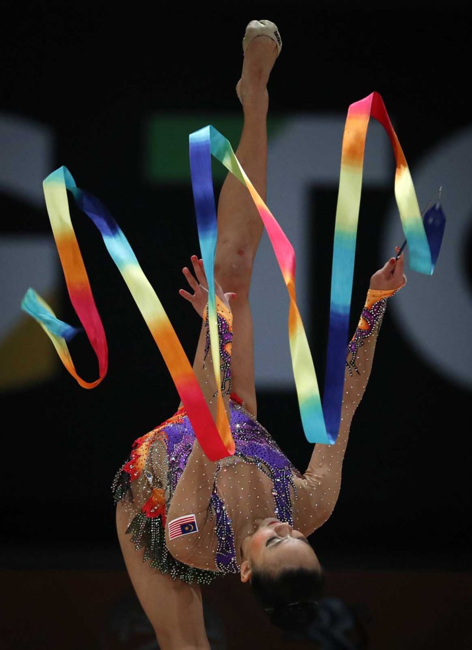 Malaysia's Amy Kwan competes at the Women's Rhythmic Gymnastics Ribbon Apparatus final of the 29th South East Asian Games in Kuala Lumpur, Malaysia on Monday.