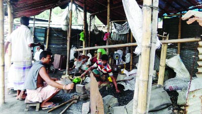 NARSINGDI: Blacksmiths at Narsingdi Bazar are busy in their shops.