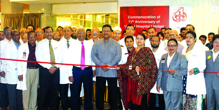 Faridur Rahman Khan, Managing Director of United Hospital Limited, inaugurating its 11th Anniversary programme at the hospital lobby recently. Consultants, Nurses and Management Staff of the hospital were also present on the occasion.