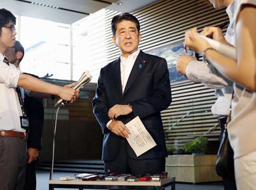 Japanese Prime Minister Shinzo Abe speaks to reporters in Tokyo about North Korea's missile launch on Tuesday.