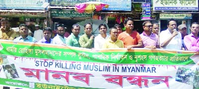 KULAURA(Moulvibazar): Bodru-uz- Zaman Sajal, President, Kulura Business Welfare Association speaking at a human chain condemning killing of Rohingyas organised by United Royals Club, Kulaura on Saturday.