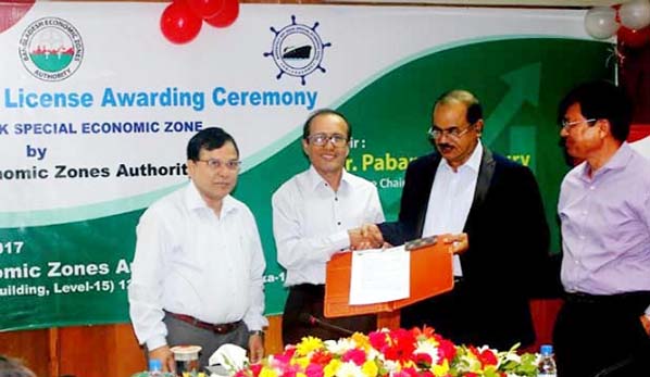 Bangladesh Economic Zone Authority (BEZA) handing over license of pre-qualification of establishing Economic Zone to Karnaphuli Drydock Ltd at BEZA office on Sunday.