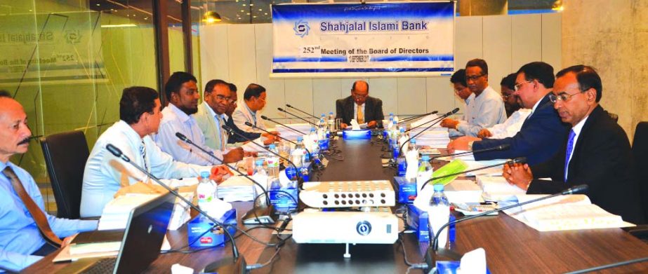 Engineer Md. Towhidur Rahman, Chairman of Shahjalal Islami Bank Limited, presiding over the 252nd Board of Directors Meeting at its head office in the city recently. Farman R Chowdhury, Managing Director, Anwer Hossain Khan, Vice-Chairmen, Khandaker Sakib