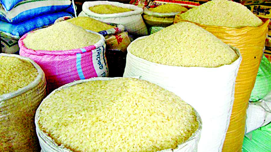 Rice prices have marked a sharp rise across the country due the 'monopoly' of a syndicate of some rice mill owners. On an average price of per kilogram rice has increased between Tk 10 and Tk 12. This photo was taken on Monday.