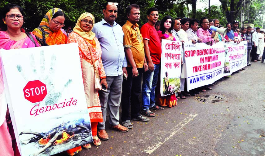 Bangladesh Awami Shilpi Ghosti formed a human chain in front of Jatiya Press Club yesterday demanding urgent steps to stop killing of Roghingyas.