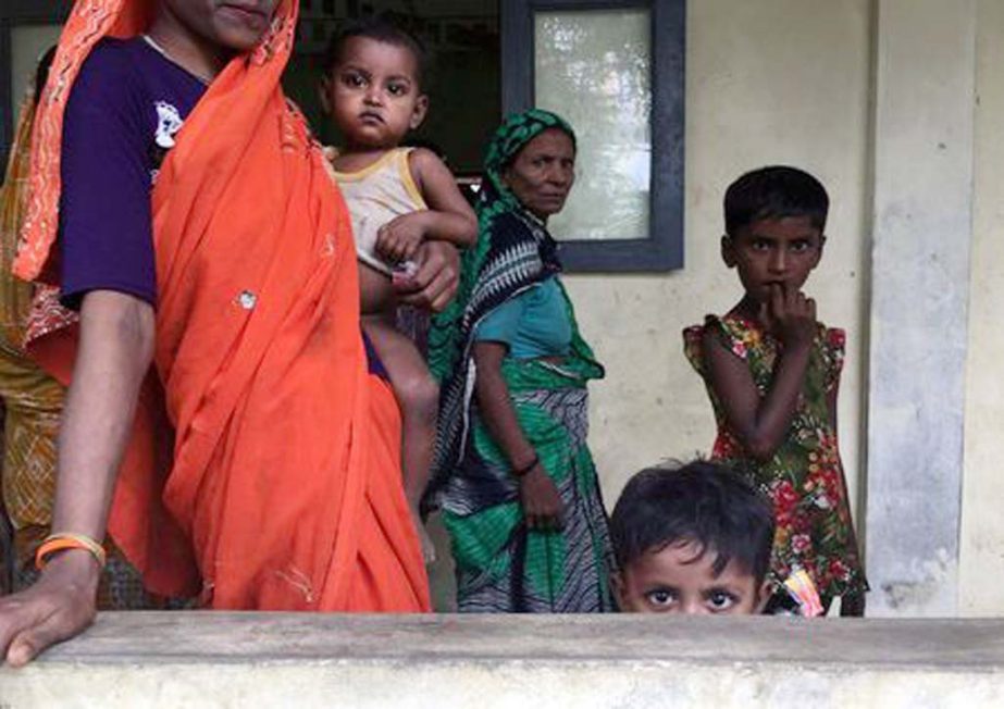 A Hindu family is seen at a shelter near Maungdaw in Rakhine State.