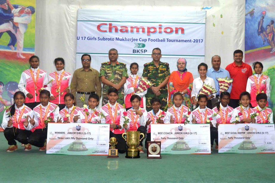 Members of BKSP Under-17 Women's Football team, the champions of the Subroto Mukherjee Cup Under-17 Women's International Football Tournament with the chief guest Director General of BKSP Brigadier General Md Shamsur Rahman and the other officials of BK