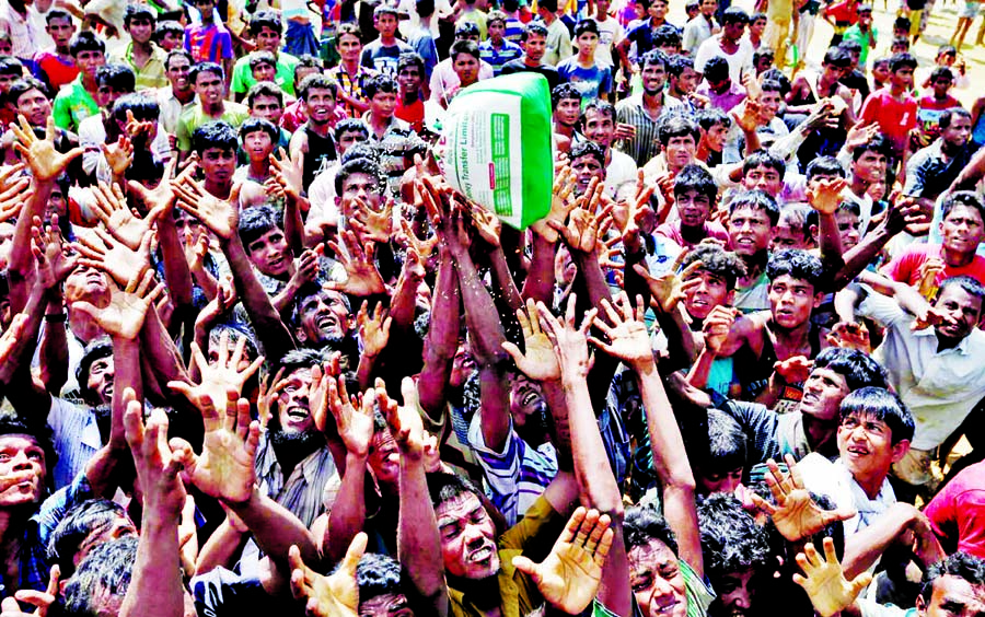 Mismanagement of relief distribution creating chaos everyday while the refugee camps are reaching full capacity with thousands of Rohingya who continue to pour into Bangladesh fleeing violence in western Myanmar. This picture was taken from Ukhiya on Thur