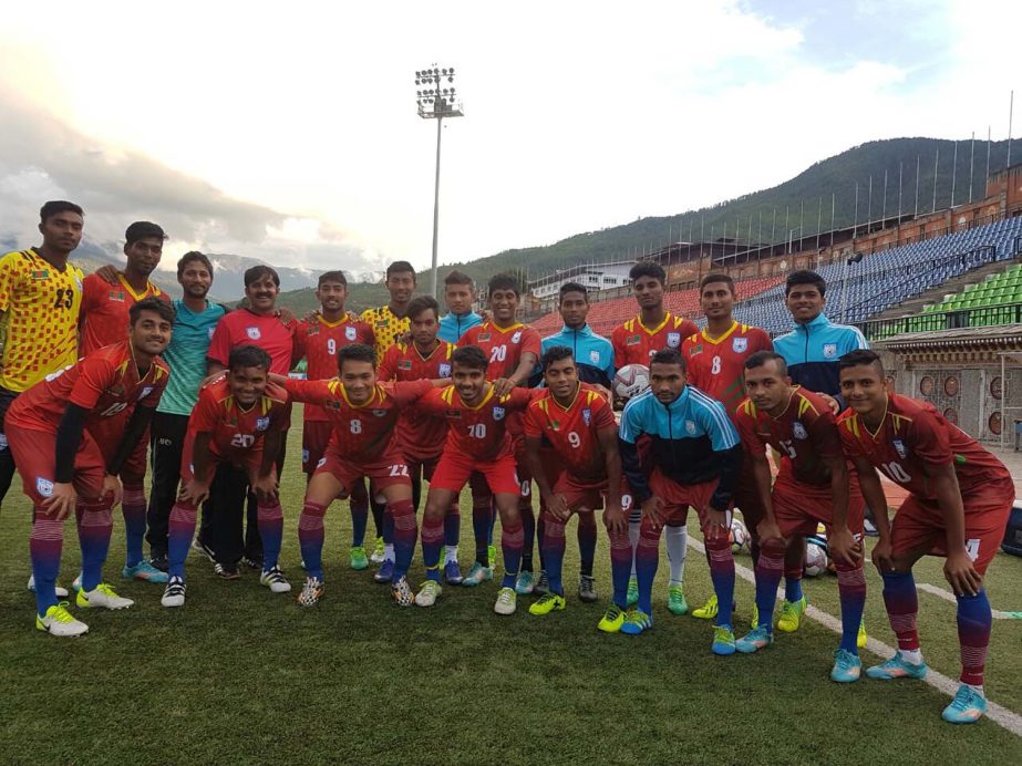 Members of Bangladesh Under-18 National Football team pose for photograph at Thimpu, the capital city of Bhutan on Saturday.