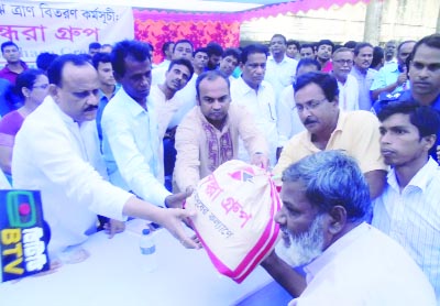 MANIKGANJ: A M Naimur Rahman Durjoy MP distributing relief goods among the flood-hit people at Daulatpur Upazila organised by Bashundhara Group recently.