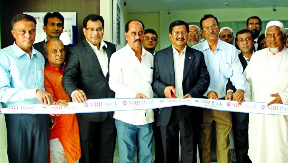 Md Mehmood Husain, Managing Director of NRB Bank Limited, inaugurating its 27th branch at Rahimanagar Bazar of Kachua in Chandpur on Sunday. Imran Ahmed, chief operating officer, Rahat Shams, head of retail banking, Md. Saiful Islam, branch manager of the