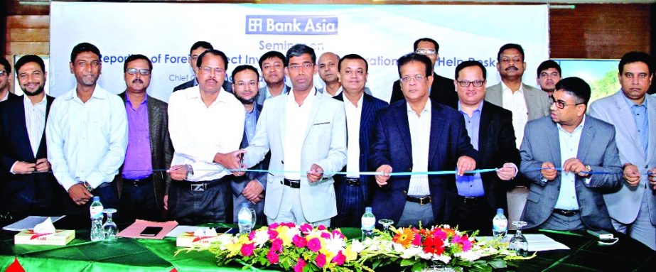 Md Arfan Ali, Managing Director of Bank Asia Limited, inaugurating a seminar on "Reporting of Foreign Direct Investment & inauguration of FDI Help Desk" in the city recently. Mrinal Kanti Sarker, DGM, Statistics Department, Bangladesh Bank, Senior Execu
