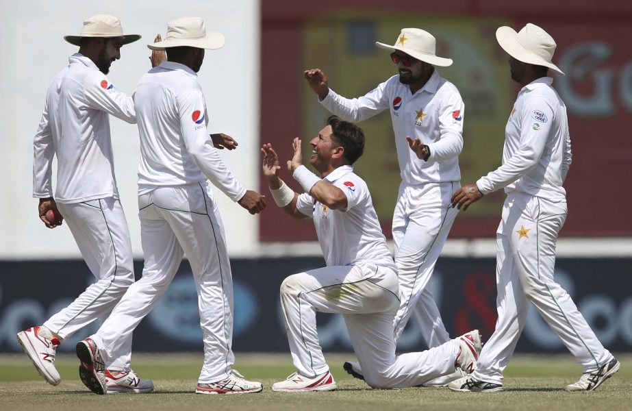 Pakistan's Yasir Shah celebrates after he dismissed Sri Lanka's Lakshan Sandakan during their fifth day of first Test cricket match in Abu Dhabi, United Arab Emirates on Monday.