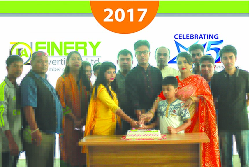 Sumon Morshed, Managing Director of Finery Advertising Limited, celebrating its 15th founding anniversary by cutting cake at its office in the city on Thursday. Top executives of the company were also present.