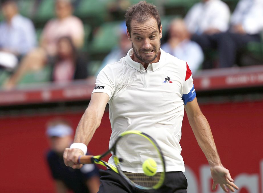 Richard Gasquet of France returns a shot against Sam Querrey of the United States during their singles match at the Japan Open men's tennis tournament in Tokyo on Tuesday.