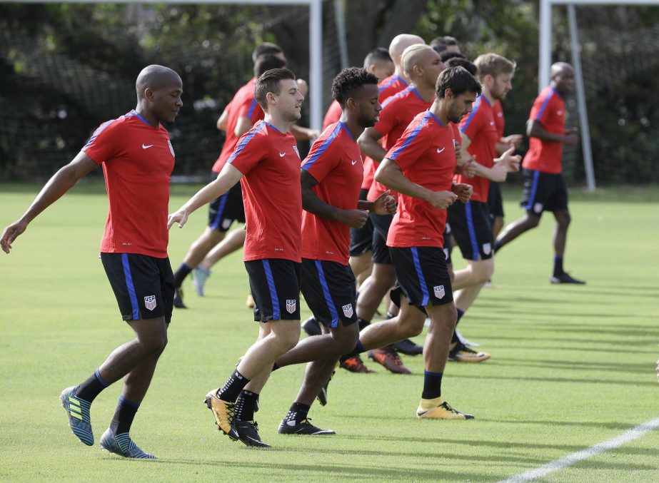 United States soccer players loosen up during a soccer training session, in Sanford, Fla on Monday. The United States hosts Panama in a World Cup qualifying match on Friday.